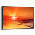 Framed canvas wall art featuring a serene seascape design with soft blue and green hues, set in a sleek black frame, ideal for coastal-themed decor.