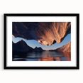 Framed black wall art featuring a serene ocean landscape with soft blue and white tones, designed to enhance modern home decor aesthetics. Perfect for creating a calming ambiance.