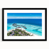 Framed wall art showcasing a serene seascape design with a black mat, ideal for coastal-themed decor, highlighting calming ocean hues and waves.