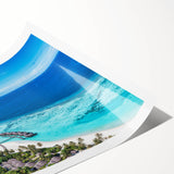 Colorful seascape wall art print showcasing vibrant blues and greens, rolled and ready for framing, perfect for coastal home decor enthusiasts.