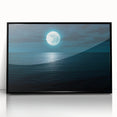 Framed wall art collection showcasing a serene seascape design with vibrant blues and greens, presented in a sleek black frame, perfect for modern decor.
