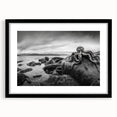 Black-framed wall art collection showcasing a stunning seascape design with a white mat, perfect for home decor, highlighting serene ocean waves and vibrant colors.
