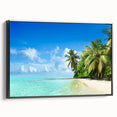 Framed canvas wall art showcasing a serene seascape design, featuring calming blue hues and intricate details, displayed with a sleek black frame for an elegant touch.