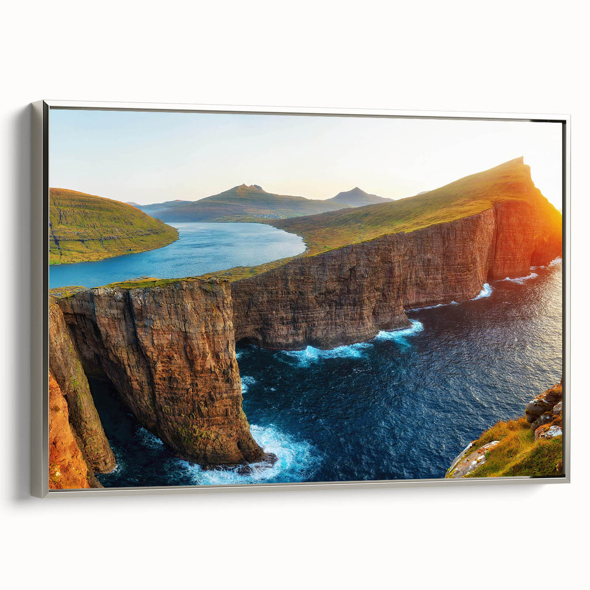 Framed canvas wall art collection showcasing serene seascapes with silver accents, highlighting tranquil ocean scenes and elegant coastal colors. Ideal for modern home decor.
