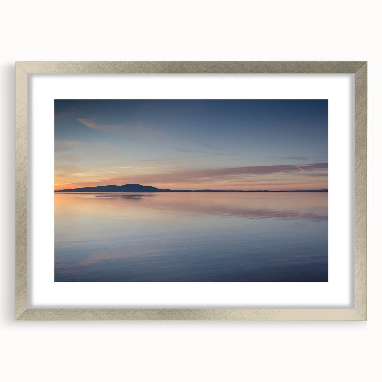 Framed silver wall art showcasing a serene seascape design, featuring soft blue and gray hues, perfect for enhancing modern home decor. Ideal for coastal-themed interiors.