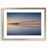Framed silver wall art showcasing a serene seascape design, featuring soft blue and gray hues, perfect for enhancing modern home decor. Ideal for coastal-themed interiors.