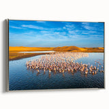 Framed canvas wall art featuring a serene seascape design with silver accents, showcasing gentle waves under a clear blue sky, perfect for coastal-themed decor.