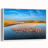 Framed canvas wall art showcasing a serene seascape design with calming blue and white tones, perfect for coastal home decor. Side view highlights its elegant frame.
