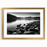 Elegant gold-framed wall art featuring a serene seascape landscape design with soft blue and white tones, perfect for enhancing any modern home decor setting.