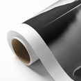 Rolled canvas artwork showcasing a vibrant seascape design with rich blue tones and gentle waves, elegantly presented in a protective cardboard tube for shipping.