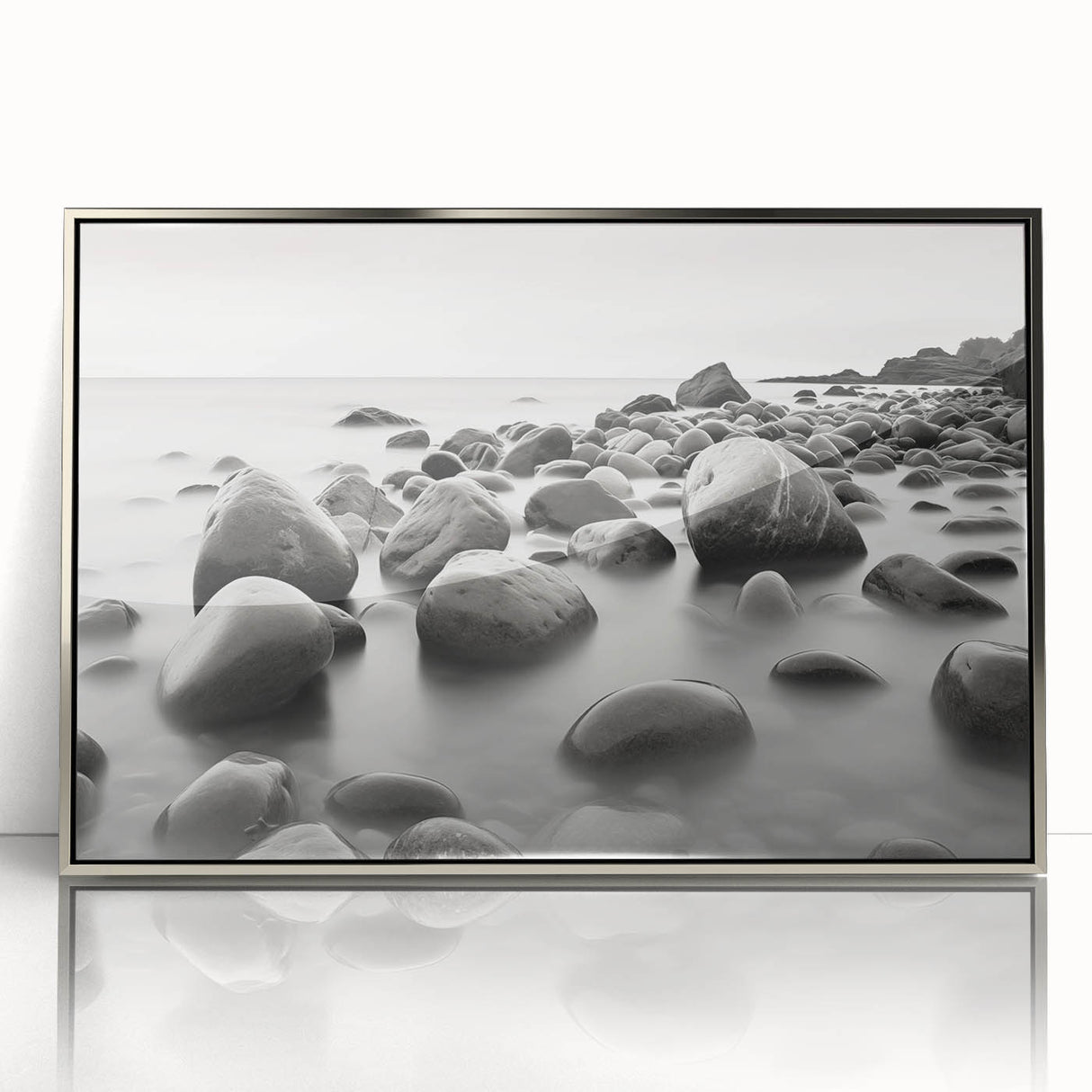 Framed acrylic wall art featuring a serene seascape design with vibrant blues and soft whites, elegantly displayed in a sleek silver frame, perfect for modern decor.