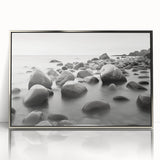 Framed acrylic wall art featuring a serene seascape design with vibrant blues and soft whites, elegantly displayed in a sleek silver frame, perfect for modern decor.