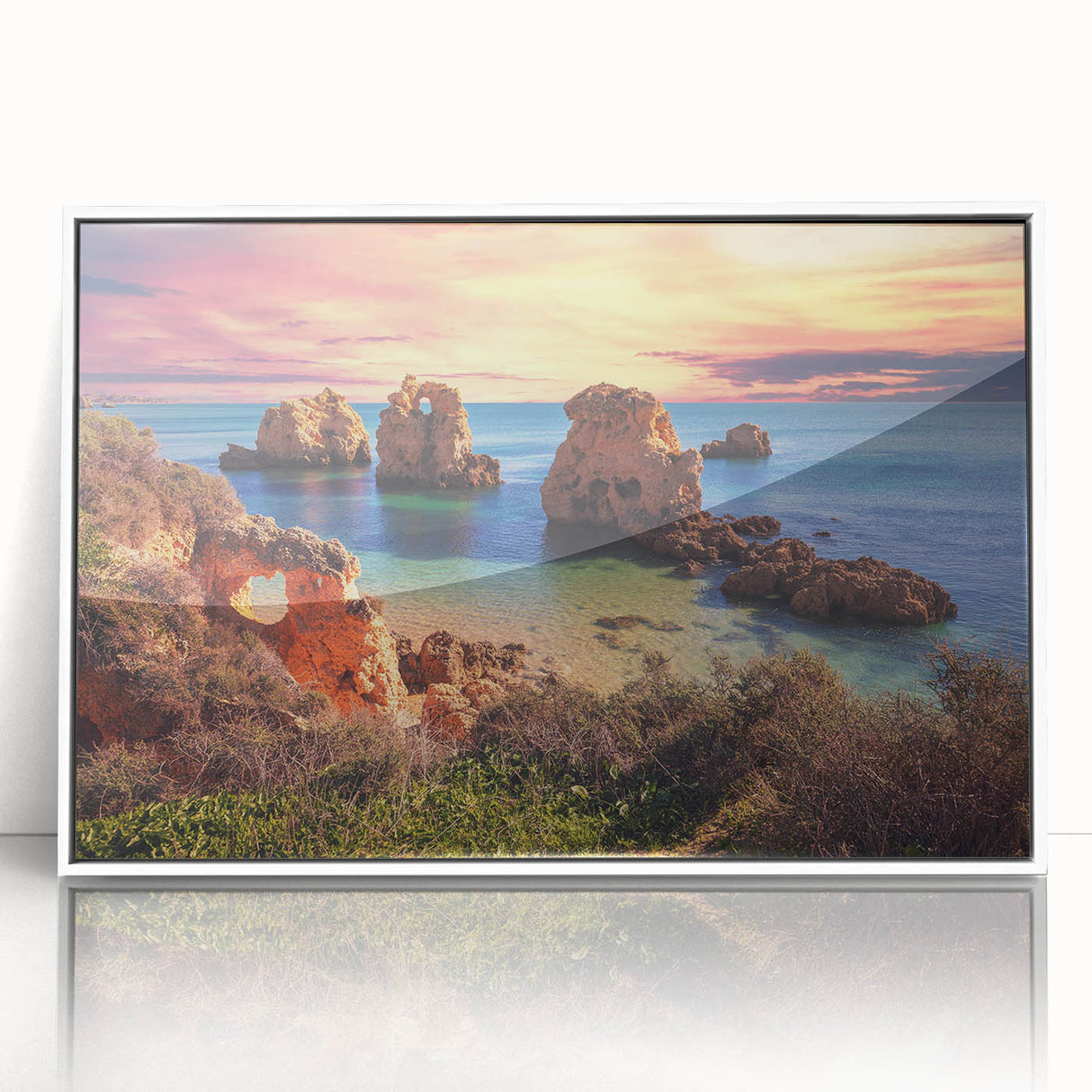 Framed acrylic wall art featuring a serene seascape design, showcasing tranquil blues and whites, ideal for coastal-themed decor in modern interiors.