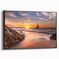 Framed canvas wall art showcasing a serene seascape design with vivid blues and greens, presented in a sleek black frame, perfect for coastal decor.