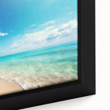 Close-up of a framed canvas wall art piece showcasing a vibrant seascape design, featuring shades of blue and green with intricate details, perfect for coastal decor.