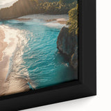 Framed canvas wall art showcasing a vibrant seascape design with rich blues and greens, perfect for coastal home decor. Ideal for enhancing living spaces with artistic flair.