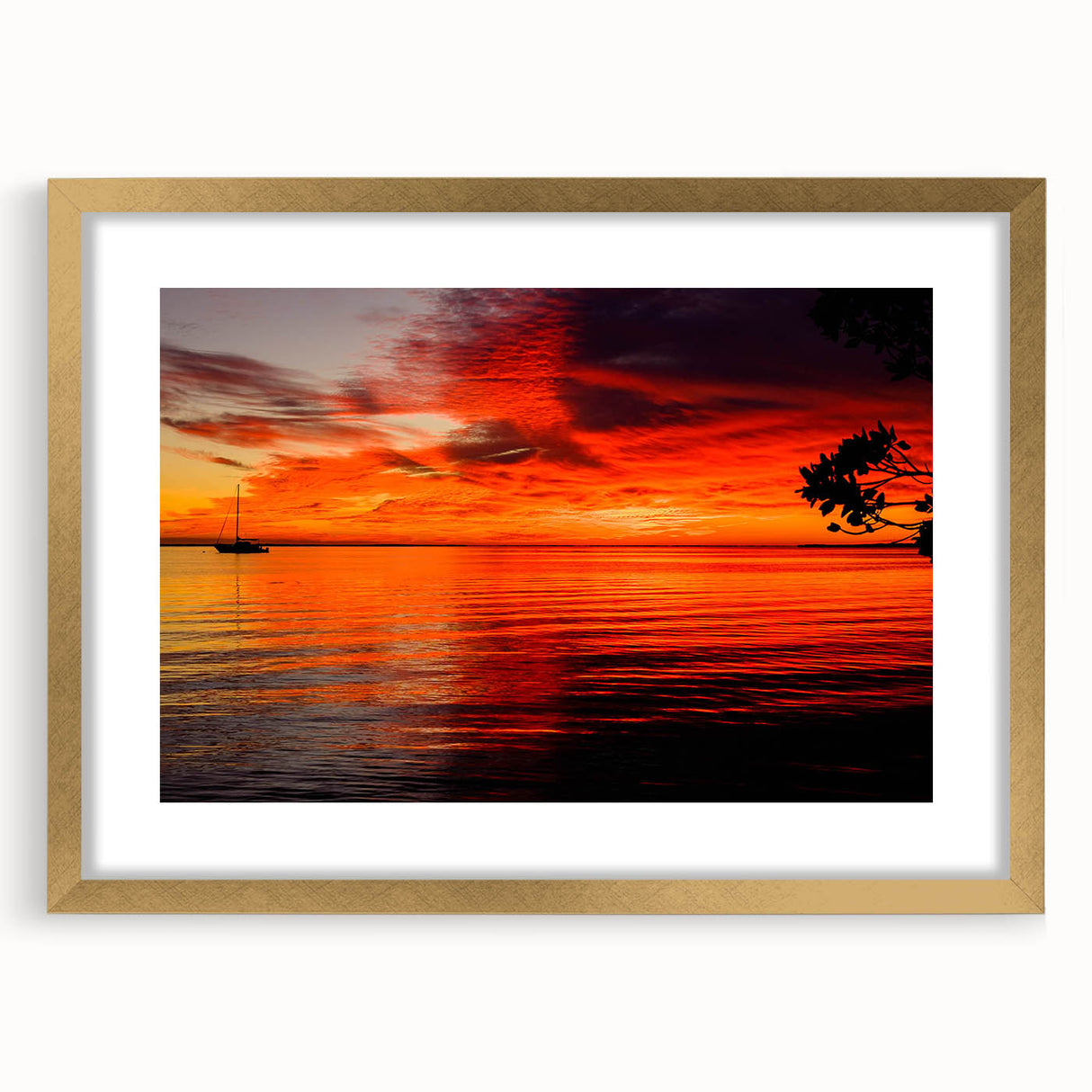 Elegant framed wall art from the Landscapes & Seascapes collection, showcasing serene ocean waves in calming blue and gold tones, perfect for enhancing home decor.