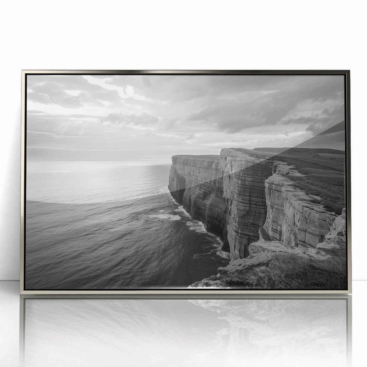 Framed acrylic wall art of a serene seascape design, showcasing soft blue and silver hues, enhancing modern decor with a tranquil coastal atmosphere.