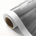 Vibrant rolled canvas art showcasing a serene seascape design with rich blues and greens, elegantly packaged in a protective cardboard tube for safe delivery.
