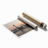 Seascape wall art collection print showcasing a vibrant coastal landscape with waves and a clear blue sky, rolled for easy handling and display.