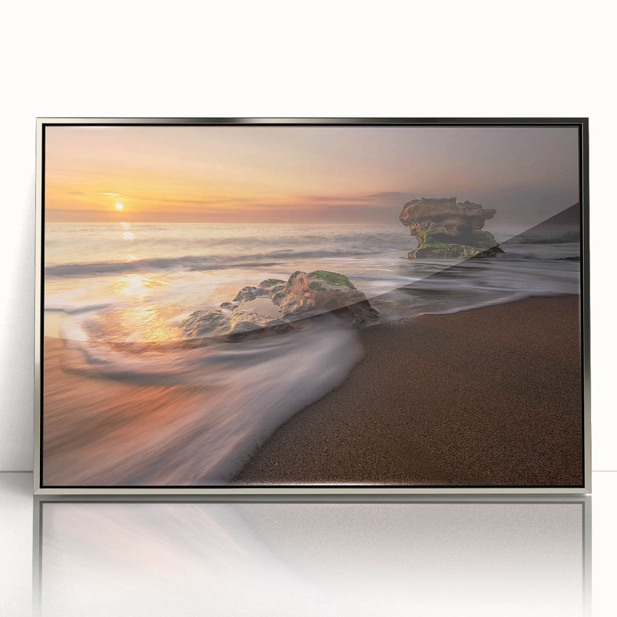 Framed acrylic wall art showcasing a serene seascape design with gentle waves and soft hues of blue and silver, ideal for coastal home decor and interior inspiration.
