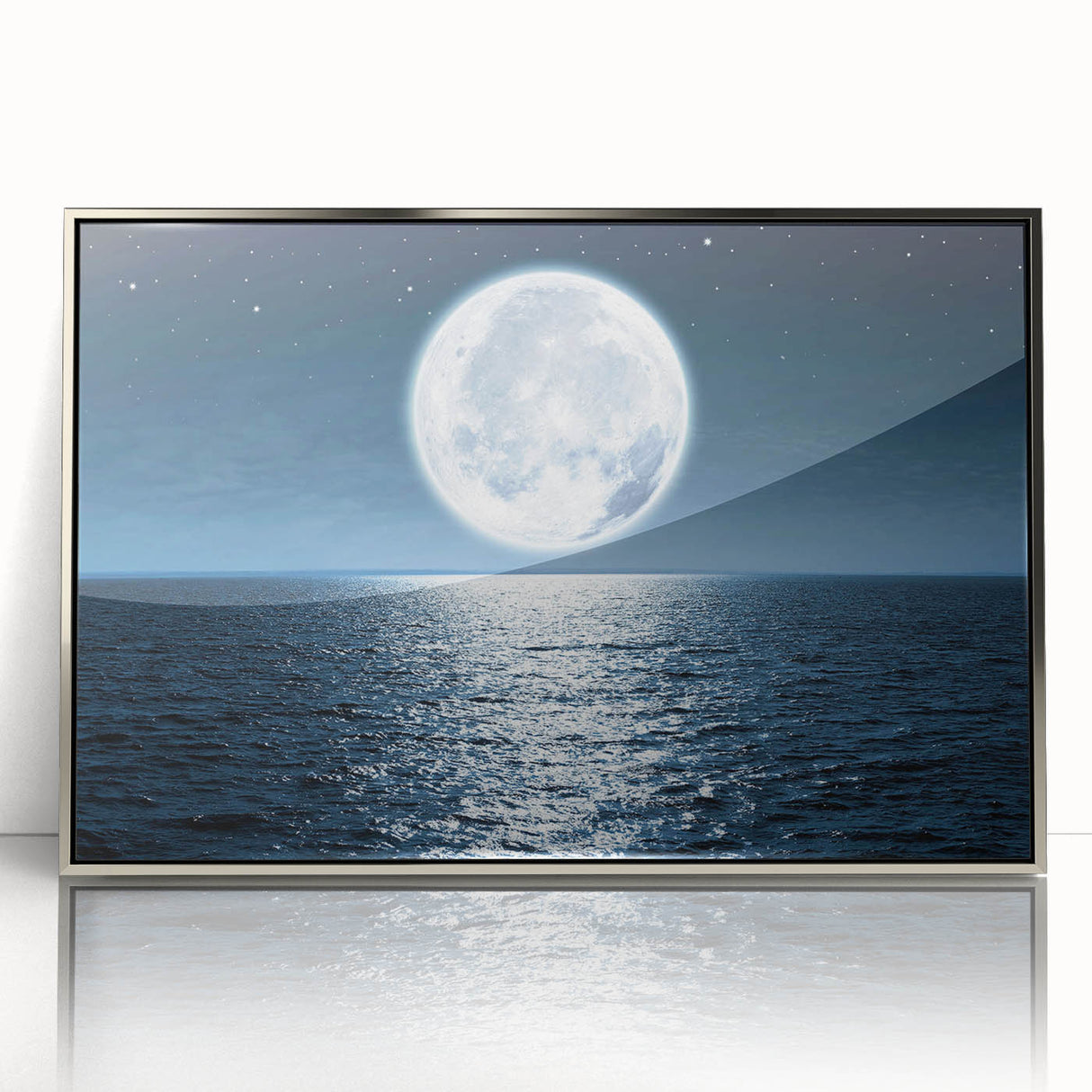 Framed wall art featuring a scenic seascape design with vibrant blues and soft whites, showcasing a serene ocean view in a sleek silver frame, perfect for modern decor.