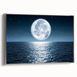 Framed canvas wall art from the Landscapes & Seascapes collection, showcasing a serene coastal scene with vibrant blues and greens, complemented by a sleek silver frame. Perfect for home decor and enhancing interior aesthetics.