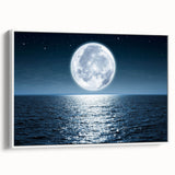 Framed canvas wall art showcasing a serene seascape design with vibrant blues and whites, presented from a side view against a clean white background.