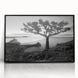 Framed acrylic wall art showcasing a vibrant seascape design with deep blues and greens, set against a sleek black frame, perfect for modern home decor.