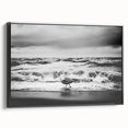 Framed canvas wall art showcasing a coastal landscape design with rich blue and green hues, elegantly presented with a black frame, perfect for modern decor.