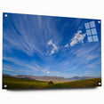 Side view of a modern wall art collection showcasing vibrant landscapes and skyscapes, featuring acrylic glass and decorative pins for elegant display.