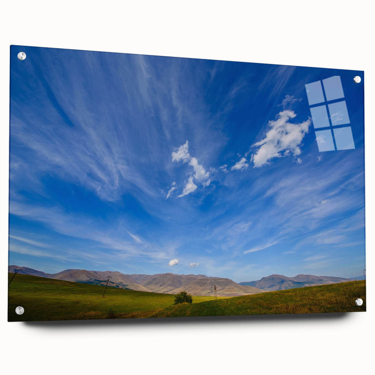 Side view of a modern wall art collection showcasing vibrant landscapes and skyscapes, featuring acrylic glass and decorative pins for elegant display.