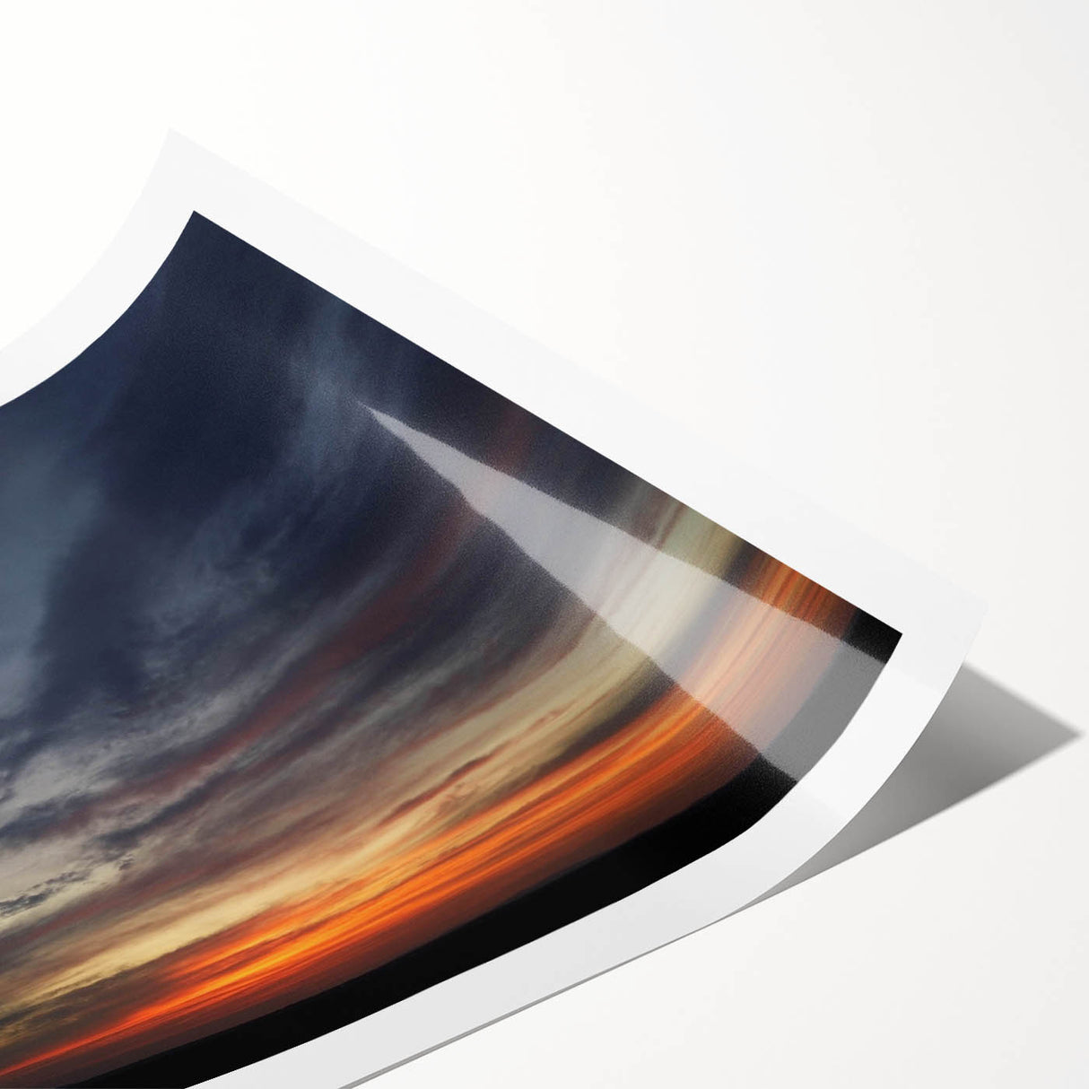 Vibrant rolled print showcasing a stunning landscape and skyscape design featuring rich colors and intricate details, packaged securely in a protective tube.
