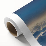 Rolled canvas showcasing a vibrant landscape and skyscape wall art design, featuring rich colors and intricate details, perfect for home decor.