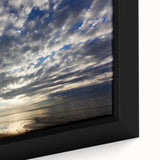 Close-up of a framed canvas wall art piece showcasing a vibrant landscape design with rich colors, ideal for home decor, enhancing interior spaces with artistic flair.