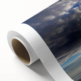 Rolled canvas showcasing a vibrant landscape and skyscape design, featuring rich colors and intricate details, ideal for home decor or art enthusiasts.