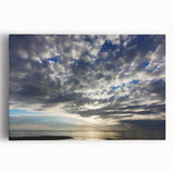 Stretched canvas wall art showcasing a vibrant landscape and skyscape design, featuring bold colors and intricate details, perfect for modern home decor.
