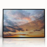 Framed wall art collection featuring a vibrant landscape design with colorful skyscapes, set in a sleek black frame. Ideal for modern decor.