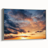 Framed canvas wall art featuring a serene landscape design with soft pastel colors, showcased from a side view, emphasizing its elegant silver frame and modern decor appeal.