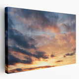 Stretched canvas wall art showcasing a vibrant landscape design with rich colors, perfect for home decor, displayed in a side view to highlight its texture and depth.