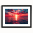 Black-framed wall art featuring a serene landscape and skyscape design, elegantly displayed with a mat, perfect for enhancing modern home decor.