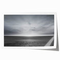 Vibrant rolled print showcasing a stunning landscape with dramatic skies, featuring rich colors and intricate details, perfect for home decor.