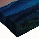 Close-up of a stretched canvas wall art featuring a vibrant landscape design with rich colors, ideal for home decor. Perfect for enhancing modern interiors.