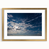 Framed wall art collection showcasing a serene landscape and skyscape design, featuring a gold mat and ornate frame, perfect for enhancing home decor.