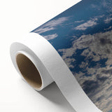 Rolled canvas displaying a serene landscape and skyscape design, showcasing vibrant colors and intricate details, ideal for home decor and art lovers.