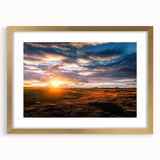 Gold-framed wall art showcasing a vibrant landscape and skyscape design, ideal for home decor, with a sleek mat enhancing its aesthetic appeal.
