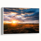 Framed canvas wall art showcasing a serene landscape with soft pastel colors and abstract sky elements, presented in a sleek white frame, ideal for modern decor.