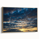 Framed canvas wall art from the Landscapes Skyscapes Design 37 collection, showcasing a vibrant sunset over mountains, with a sleek gold frame enhancing the aesthetic.