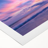 Colorful rolled canvas artwork depicting a serene landscape with vibrant skyscapes, designed for home decor, showcasing rich hues and textured details. Perfect for enhancing interior spaces.