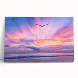 Stretched canvas wall art showcasing a vibrant landscape with dramatic skies, leaning against a neutral wall, ideal for home decor enthusiasts seeking modern aesthetics.